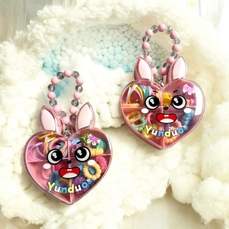 Set Accesorii Păr în Cutie Inimă tip gentuța – elastice și clame colorate
